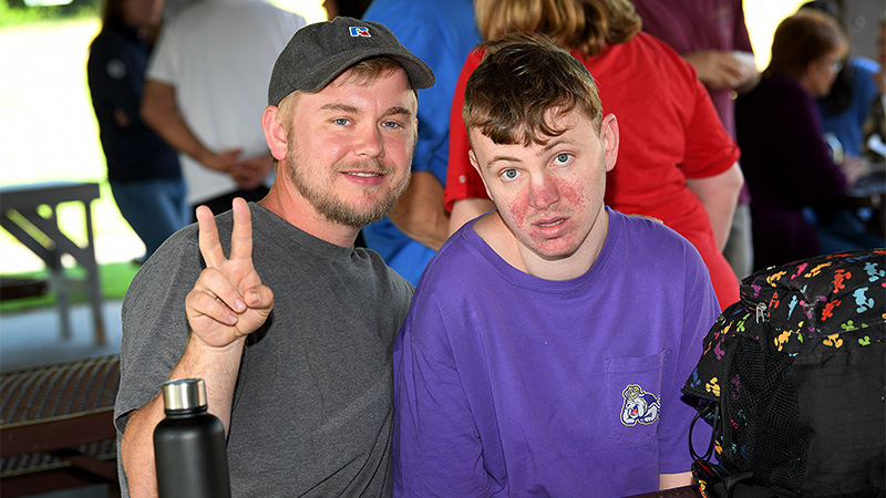 Photo of two guys outside